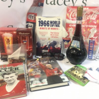 A Collection of various World Cup items including Bobby Charlton book of soccer, boxed beer glasses, Goal 98 bottled by Cevin Spa Pontedera Italy. This lot cannot be posted