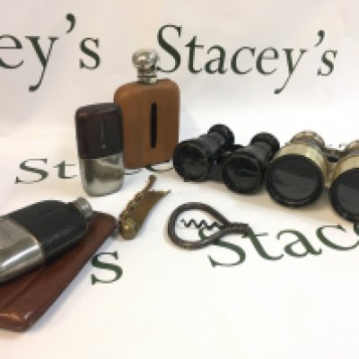 A collection of vintage hip flasks and binoculars including a pair of Iris Touring binoculars . This lot cannot be posted
