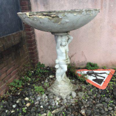 a pair of composition, concrete, garden, ornaments, large dishes, supported by putti damaged tops no reserve . Height 120cm. NO RESERVE