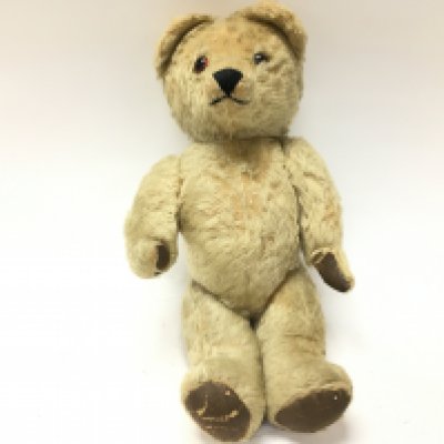 A vintage teddy bear. Approximately 18 inches tall. Postage B