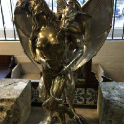 A Modern Contemporary erotic bronze statue of nude female embraced by a two headed dragon. The sculpture by Rodolfo Bucacio an established contemporary artist. The sculpture described by European art critics as Expressive Modernist art. A medium size stimulating bronze of monumental importance. Small limited edition. Height 90cm