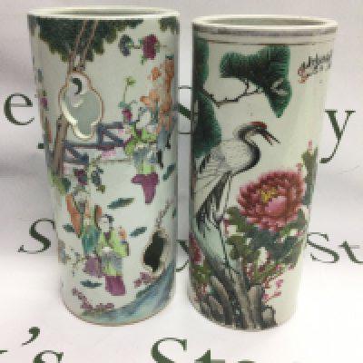 Two Chinese vases, one with piercework decoration and painted with figures in a garden setting, the other being painted with a heron among foliage, approx heights 28cm and 29cm. Shipping category D.