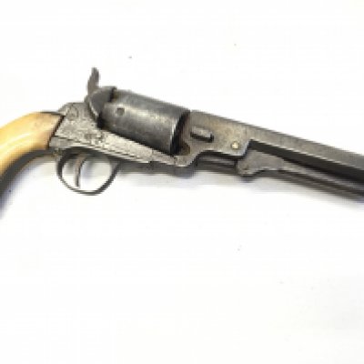 A 19th century percussion pistol with a bone grip with serial number 355 ? Stamped in the underside of the action with light engraving no other markings. action functional.