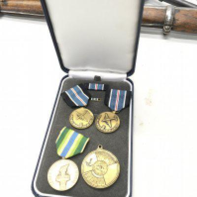 Three American military medals awarded for Humane Action The Berlin air humanitarian relief drop post Second World War and others.