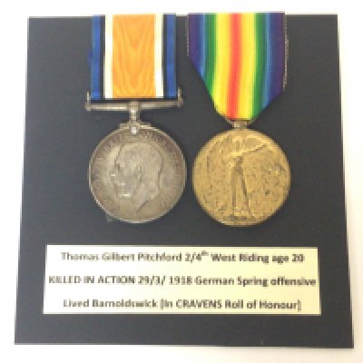 Two I world war medals awarded to 268838 PTE Thomas Gilbert Pitchforth killed in action 29/3/1918 with intresting retrospective paperwork.