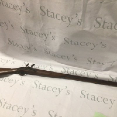 A British early 19th century flintlock sporting gun light weight with a half length stock flintlock action maker Hartwell Stow. Engraved and shaped steel trigger guard. the barrel with proof marks.