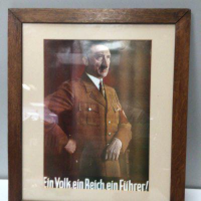 A German II world war colour poster portrait of Adolf Hitler and with the text One People One Empire One Leader.