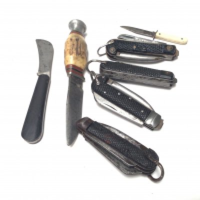 A collection of Vintage folding multi purpose pocket knifes a small vintage hunting Knife with a horn handle.