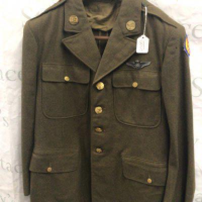 An American II world war Military jacket with applied retrospective badge.