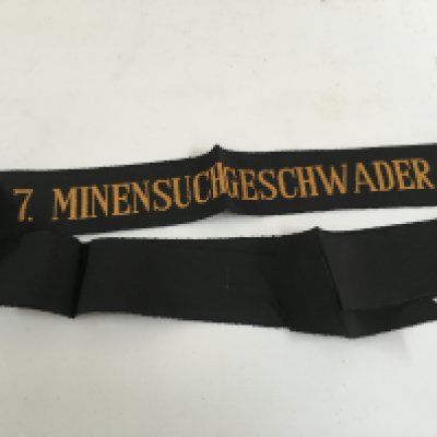 A collection of naval cap tallys consisting of a cap tally showing on it the vessel HMS Neptune, cap tally from the Royal Navy HMS Pembroke, cap tally from the royal naval vessel HMS Sultan, cap tally from the Royal Naval training base HMS Raleigh, cap tally from the royal naval vessel HMS Dryad and cap tally from German ship minensucher geschwader 1