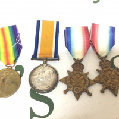 A Group of three I world war medals awarded to 4060 PTE R W Gibson R Fus. and a 1914 star awarded to 1745 Pte S Hunter 2/s LanR. (4)