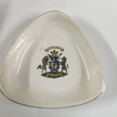 Collection of merchant shipping items consisting of early 3-sided China dish from South African marine line, small floral China dish from the Dresden line paddle steamer company circa 1930s, original American president line picture ashtray, ships China bowl from the Dalgeish steamship company and rare shipping company half moon China serving plate from the palmer line