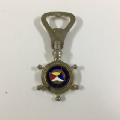 A collection of orient line items consisting of as new sailor doll souvenir from the orient line vessel the SS Orsova, as used in service orient line shipping company dining plate, bottle opener from the vessel SS Oronsay, original as used in service coffee cup and saucer from the orient line, original as used on board orient line seashell design dining side plate, original ships accommodation plan for the RMS Ormonde of the orient line from 1924