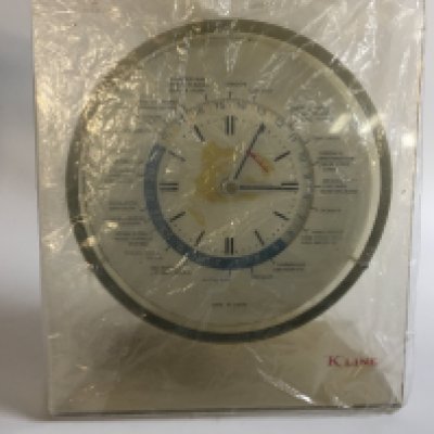 Collection of merchant shipping items consisting of a special Christmas tin from the knutsen line, souvenir bowl from the British and commonwealth line, original Kawasaki line freestanding ship clock, on Baird souvenir items from the America United States circa 1960s and a pewter serving bowl from the wilhelmsen line