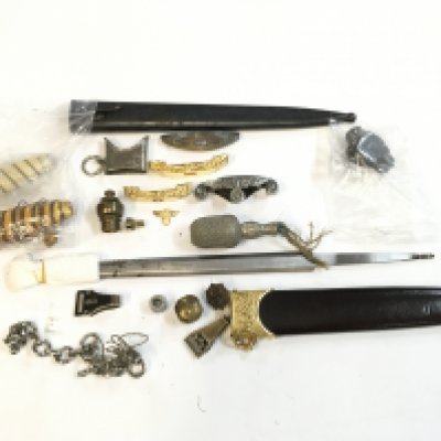 an assortment of WW2 nazi German dagger parts including naval and Luftwaffe grips, hanger clips, chain knot , army dagger blade etc. this lot cannot be posted