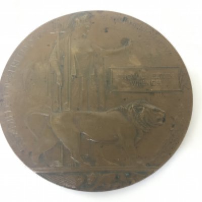 A First World War bronze Memorial plaque Death Penny awarded to Thomas Elwin Wrench