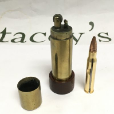 A trench art lighter and a penknife (2). Shipping category D.