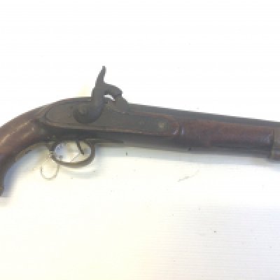 An Early 19th century Percussion pistol. With brass fittings possible East Indian Company.