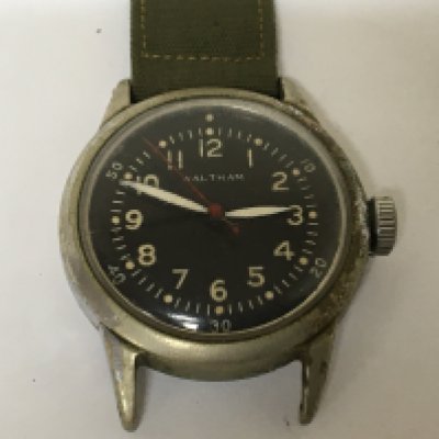 An American Military Waltham Watch black dial red second hand not seen working.
