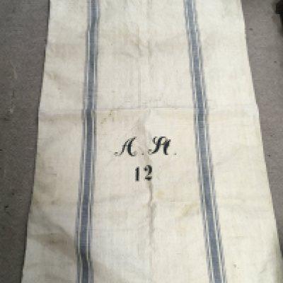 A German Third Reich grain sack, dated 1943. dimensions 118x71cm . Postage category B