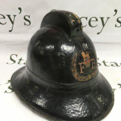 A vintage fireman's helmet. Shipping category C.