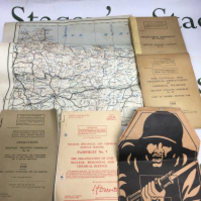 1930-40 military training books and maps. Shipping category A.