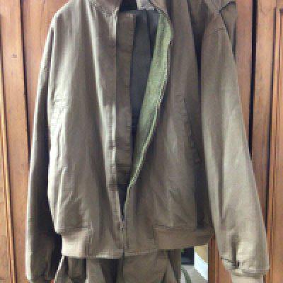 An American Military issue jacket and trousers combat winter jacket in label.