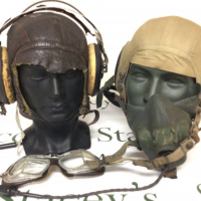 Two American Airforce flying caps with original attachment II world war. and a Military issue rucksack