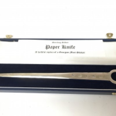 A cased silver hallmarked paper knife. Postage category B