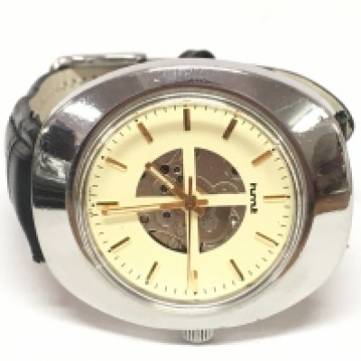 A mens vintage automatic open heart watch by HMT. 38mm case . Seen working