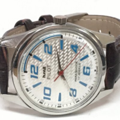 A vintage mens HMT Manual wind sports watch , 35mm case, seen working. Postage category A