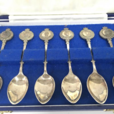 A cased set of hallmarked silver commemorative spoons