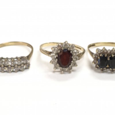 9ct gold rings set with gem stones , total weight 6.6g . Postage category A