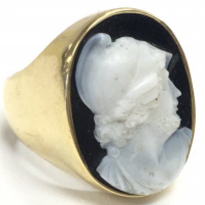 An 18 carat gold and sardonyx cameo ring. Size O. 15.7g Postage category A