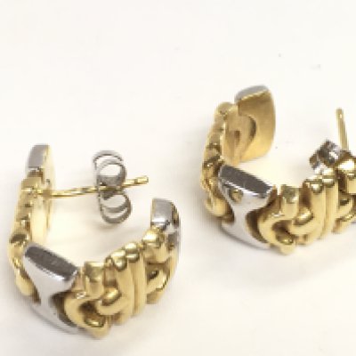 A pair of 18ct two tone gold earrings. 10.3G Postage category A