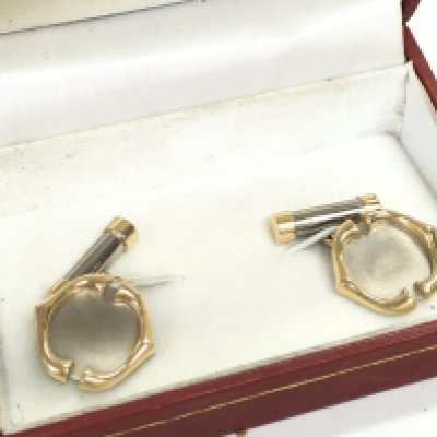 A pair of 18ct gold Cartier cufflinks. Total weight 10.2g Postage category A