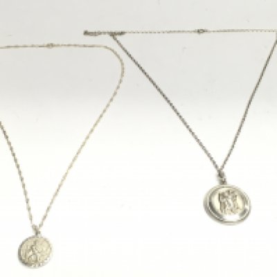 Two silver St Christophers on silver chains by Georg Jensen. Postage category A