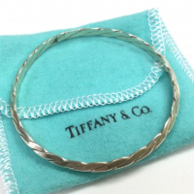 A silver Tiffany and Co twisted rope bangle. Postage category A