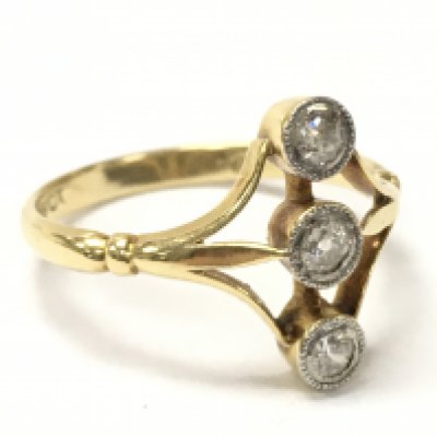 An 18ct gold and platinum 3 stone diamond ring, ring size N/M. Total weight 2.3g Postage category A