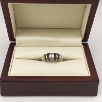 A 9ct gold diamond and sapphire ring. Approx weight 2.97 grams, Approx size L1/2.