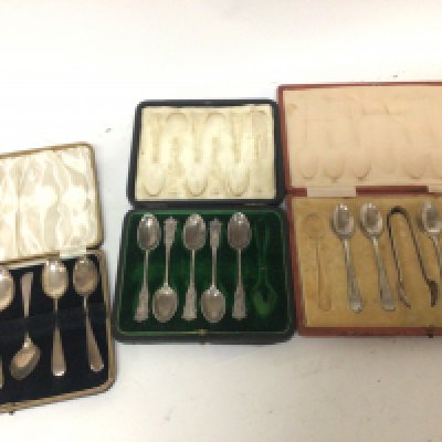 Three cased sets of silver spoons I fitted cases two spoons missing.