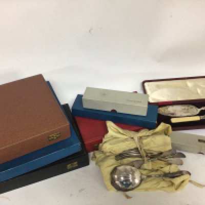 A quantity of cased silver plated cutlery and loose cutlery.