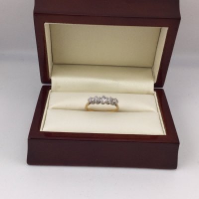 A Four piece silver tea set with hot water jug tea pot cream jug and sugar bowl Sheffield hallmarks good condition total weight approximately 1995g.