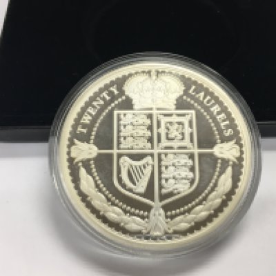 A 2019 400th anniversary solid silver proof 5oz laurel with COA.Postage B