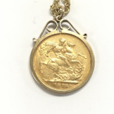 A 1878 full sovereign with Melbourne mint mark in 9ct mount with chain. 15.70gPostage B