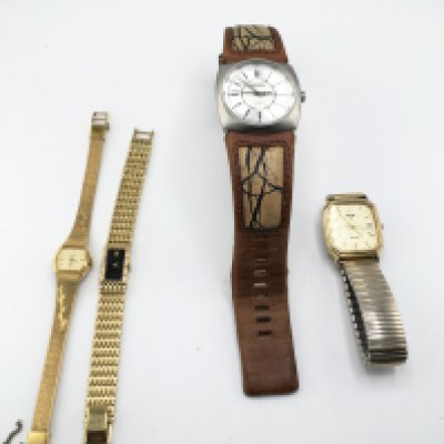 A collection of four dress watches including Diesel Seiko etc. Postage B. NO RESERVE