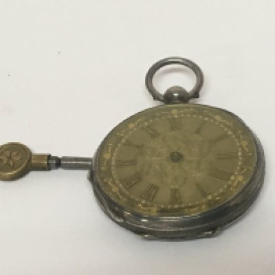 A silver cased key wind pocket watch with a key for restoration. NO RESERVE