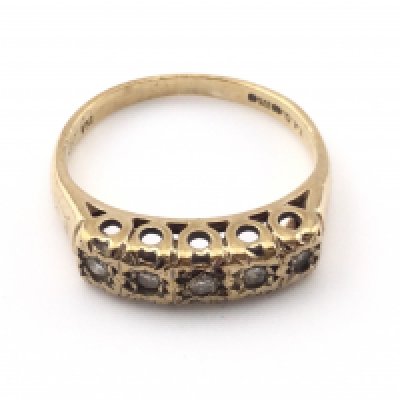 A 9k gold ring set with 5 small diamonds. Size I 1/2 and 2g Postage A