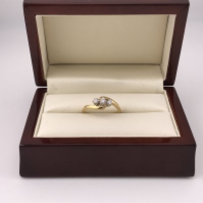 A three stone 18ct diamond ring, approx weight 3.7 grams. Approx ring size N 1/2.