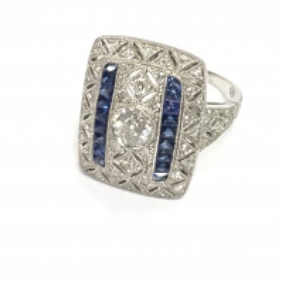 Platinum ornate art deco style sapphire and diamond dress ring. Central old cut diamond 0.53ct sapphire 0.30ct and accent diamonds 0.60ct. Size N Postage A